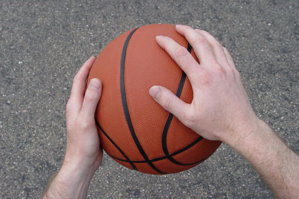 Basketball held firmly in hands