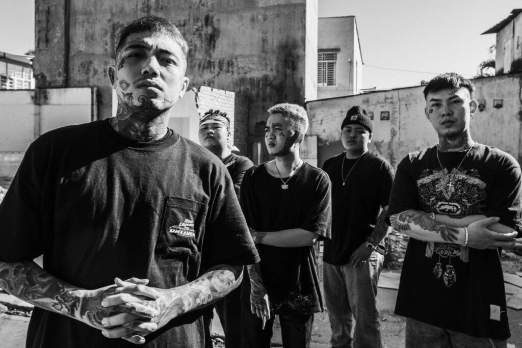 Gang with tattoos on City street