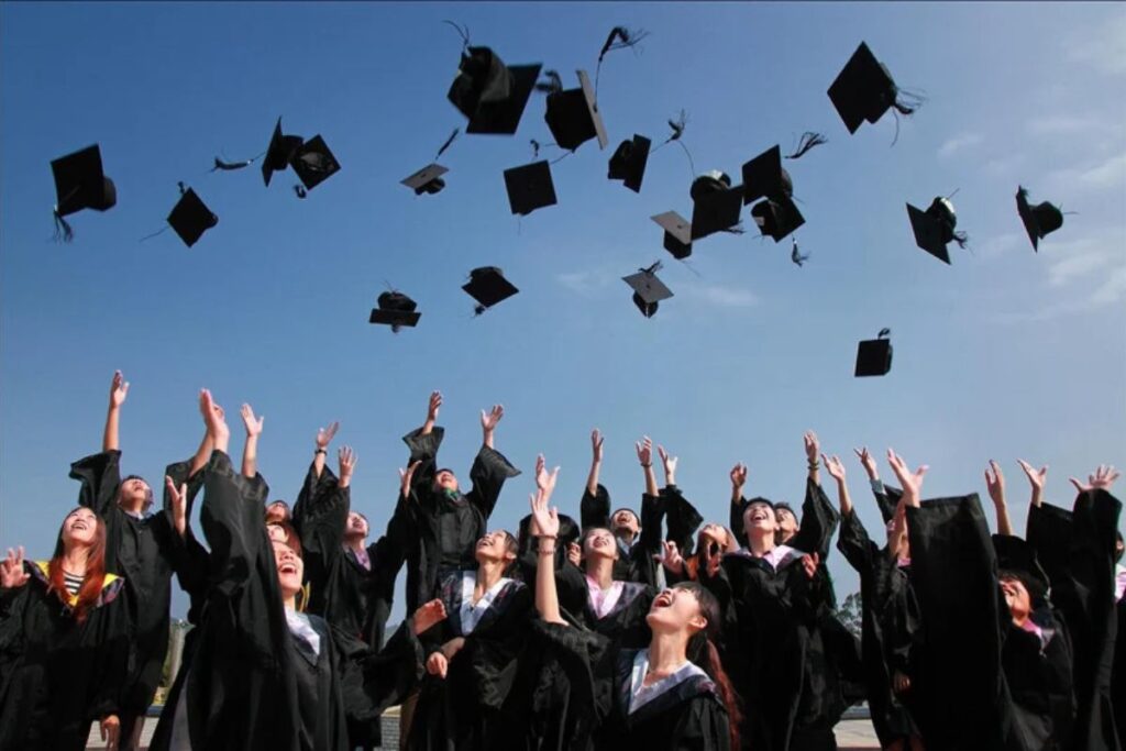 Graduating Students Throwing Hats